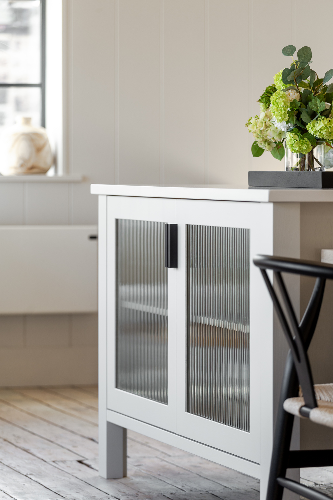 Fluted glass doors on a kitchen island